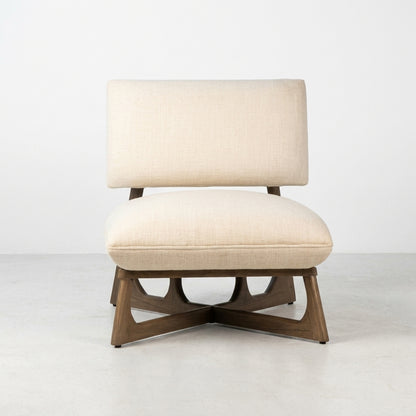 Modern cream chair with wooden legs.