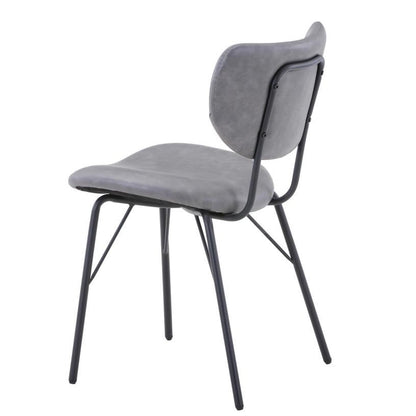 Gray padded chair with metal frame, viewed from the side.