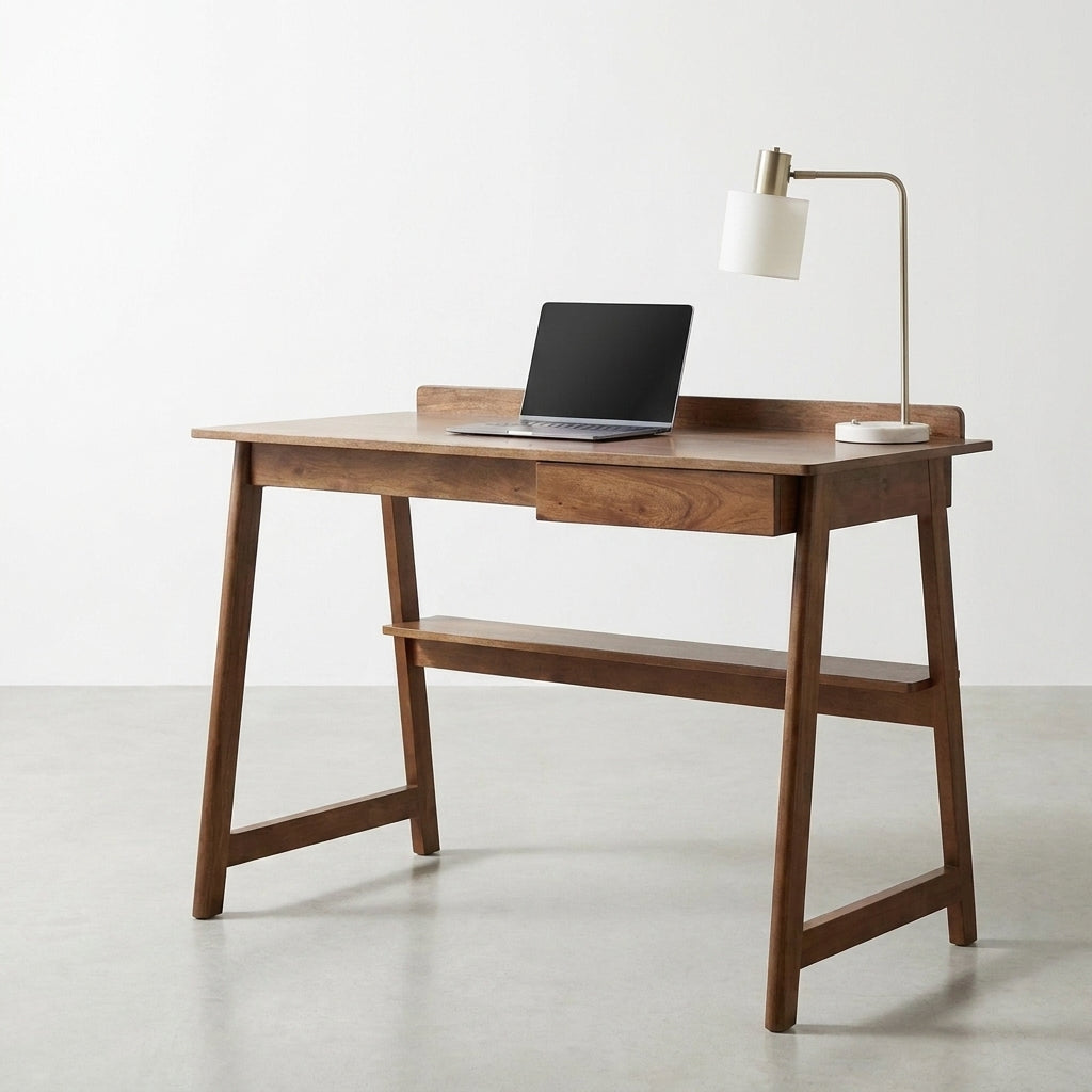 Wooden desk with laptop and lamp, minimalist design.
