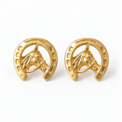 Gold horse and horseshoe cufflinks on white background.