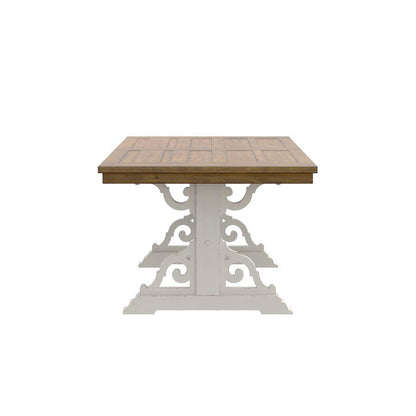 Wooden table with ornate white metal base, front view.