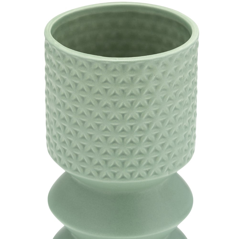 Light green textured ceramic vase, geometric pattern.