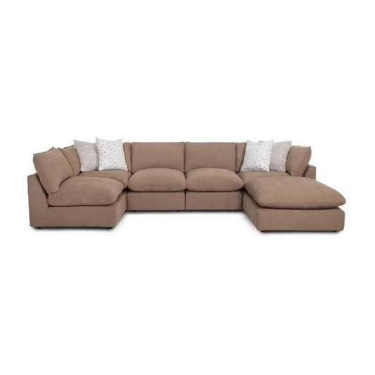 Brown L-shaped sectional sofa with white pillows.