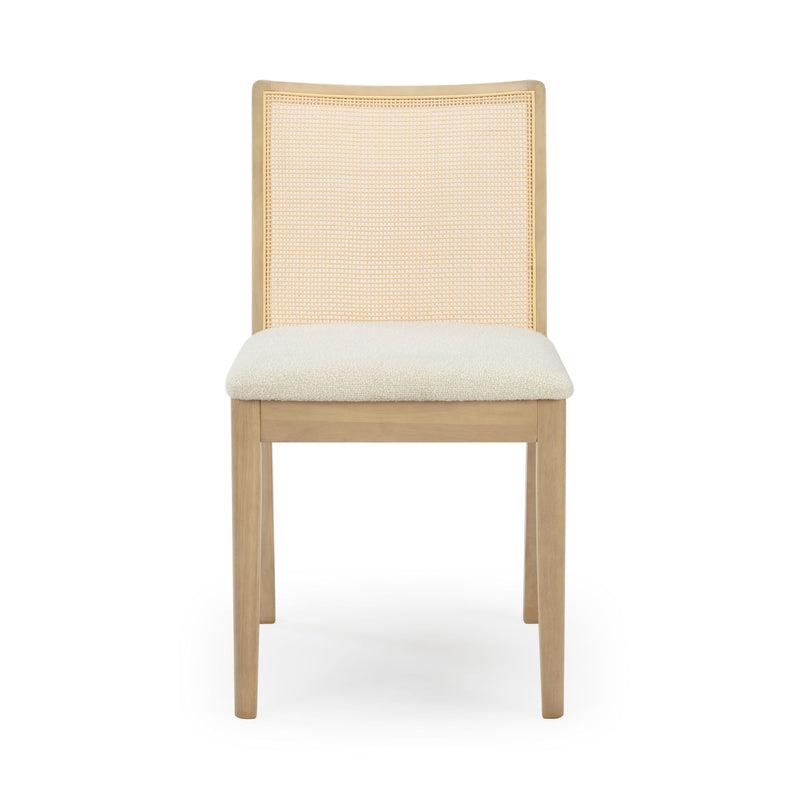 Wooden chair with a woven backrest and a white cushioned seat.