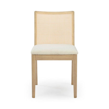 Wooden chair with a woven backrest and a white cushioned seat.