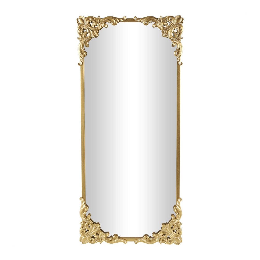Ornate rectangular mirror with a golden frame.