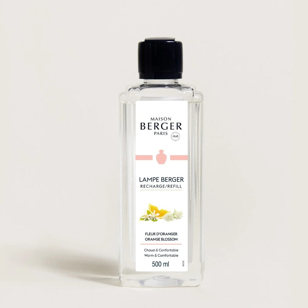 Clear bottle of Maison Berger Orange Blossom fragrance refill.