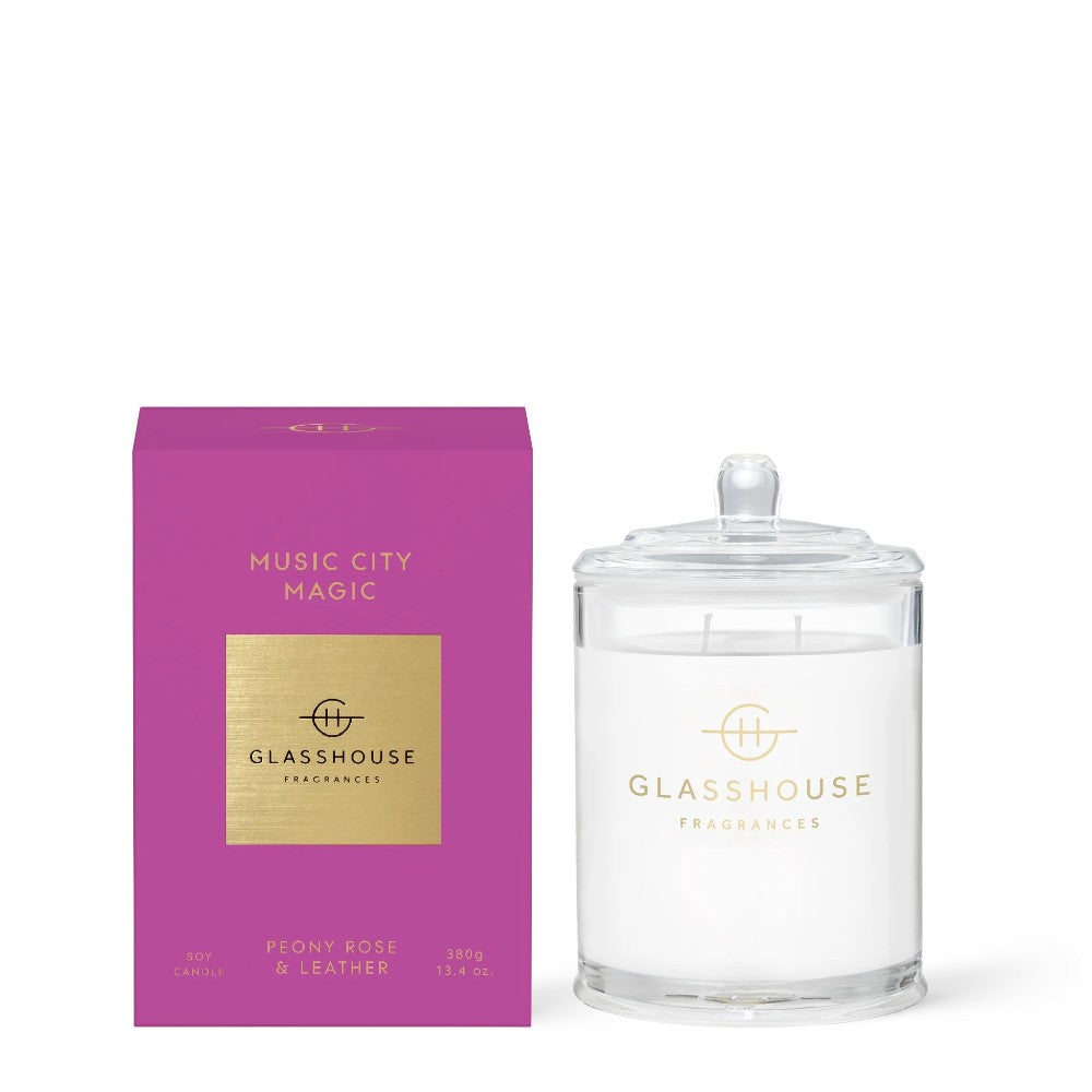 Purple box with "Music City Magic" candle, peony rose & leather scent.