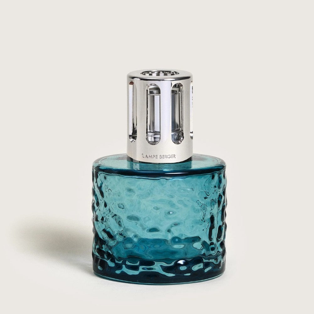 Textured blue glass lamp with a silver metallic top.