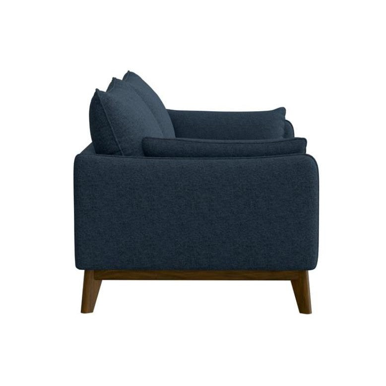Navy blue sofa with wooden legs, viewed from the side.