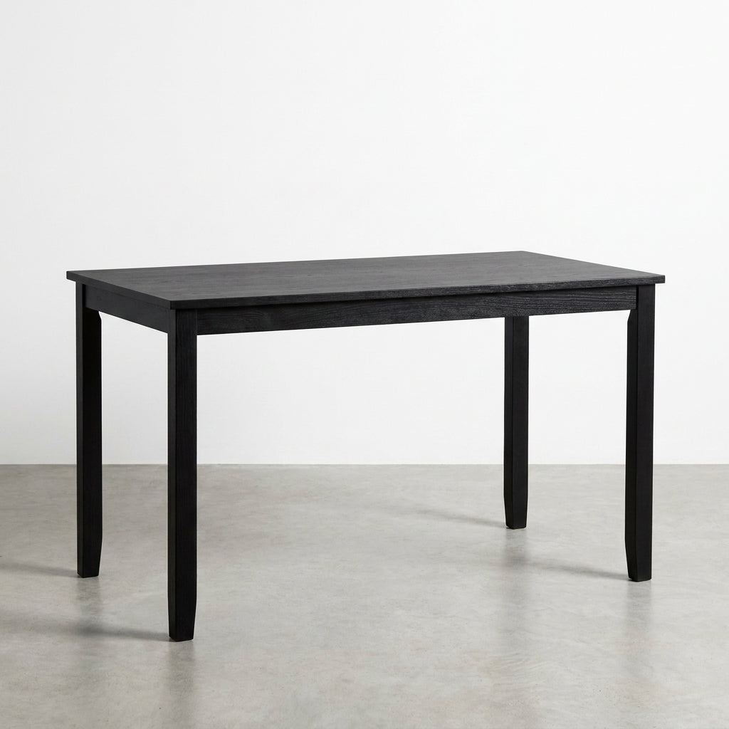 Simple black rectangular table with four legs.