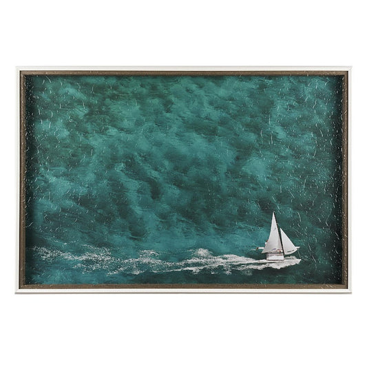 Sailboat gliding through deep teal waters.