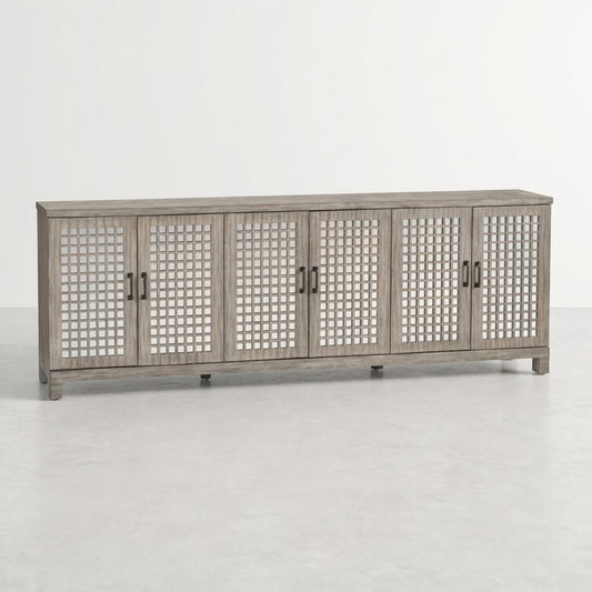 Wooden sideboard with lattice-patterned doors and black handles.