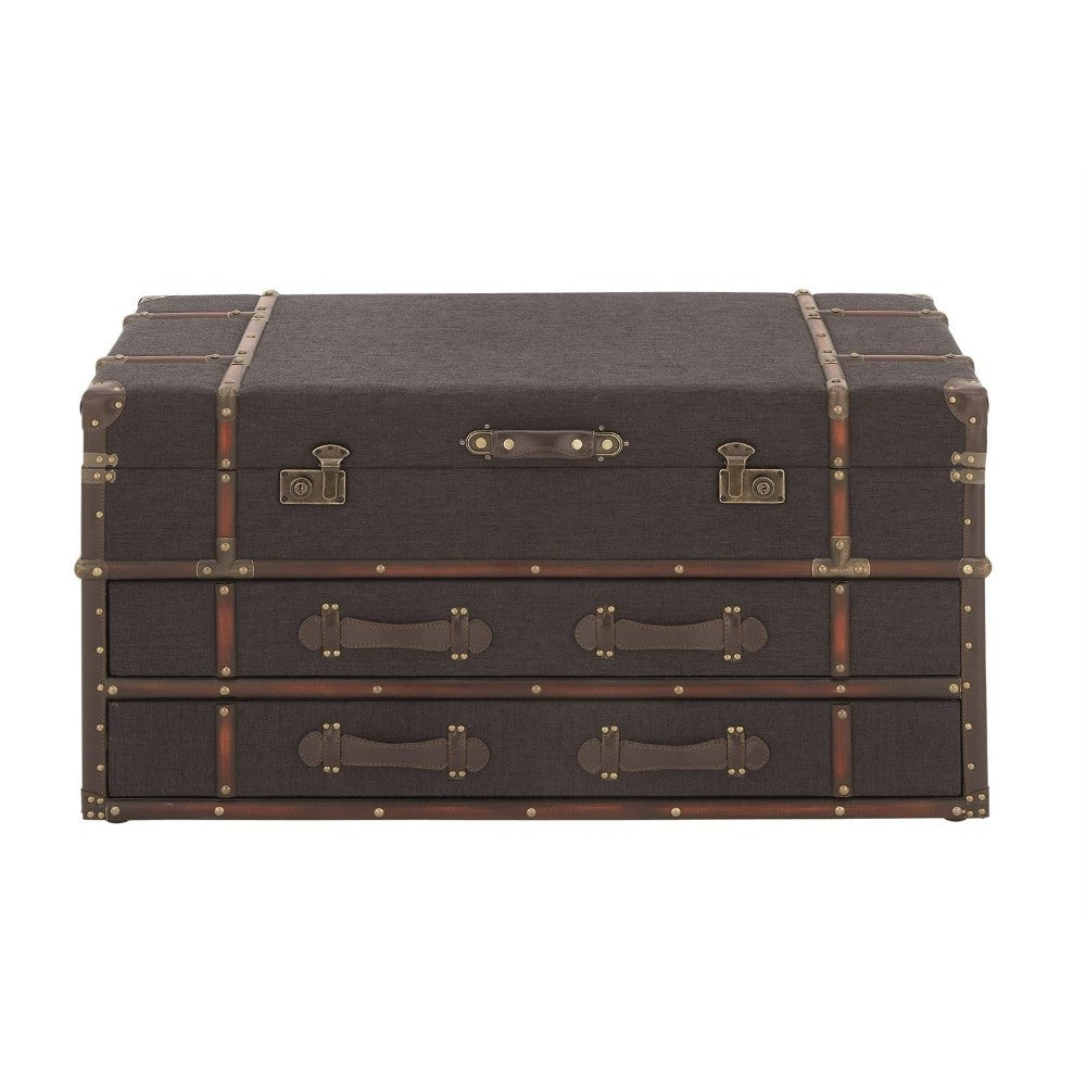 Vintage-style brown trunk with brass fittings and leather accents.