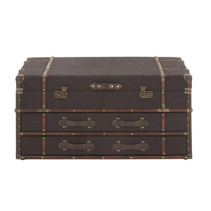 Vintage-style brown trunk with brass fittings and leather accents.