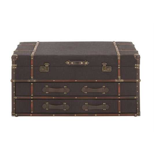 Vintage-style brown trunk with brass fittings and leather accents.