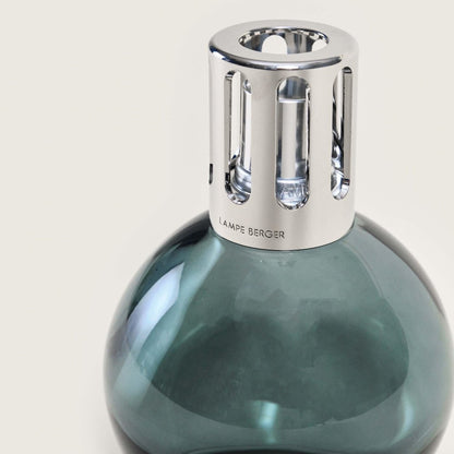 Elegant Lampe Berger with a sleek silver cap and smoky glass base.