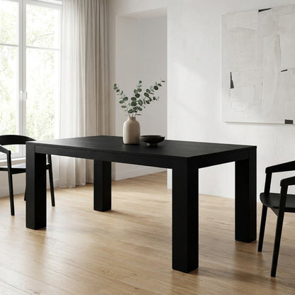 A simple, black, rectangular table with sturdy legs.