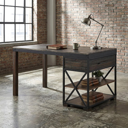 Industrial-style desk in a loft with shelves, a lamp, books, and a mug.