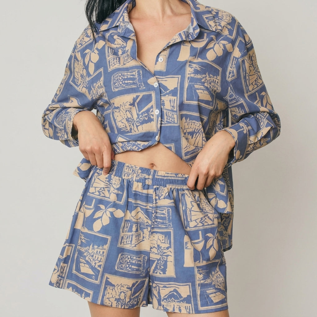 Person wearing a blue patterned shirt and matching shorts.