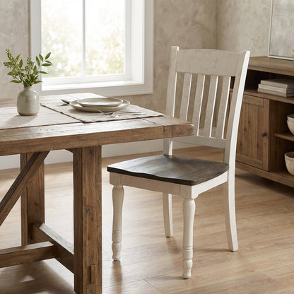 Wooden chair with a white frame and dark seat.