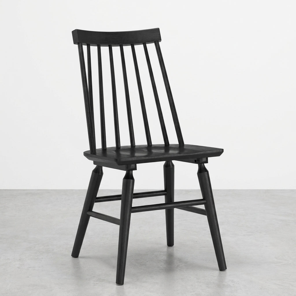 Black wooden chair with vertical slat back and simple design.