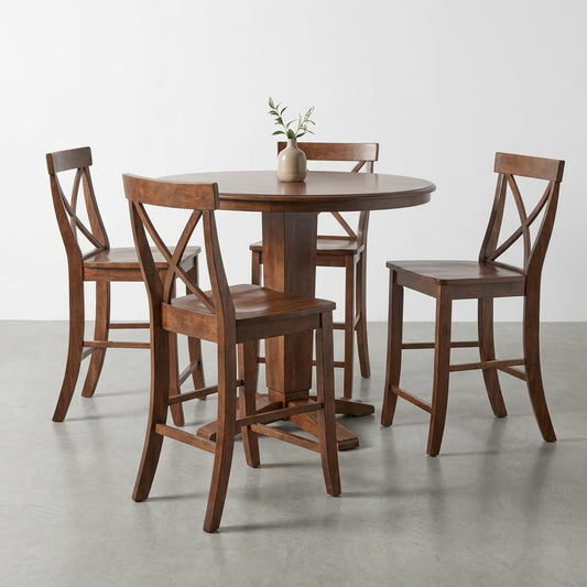 Wooden dining set with four chairs and a vase on the table.