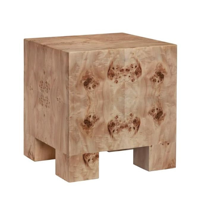 Wooden block stool with a natural, patterned grain.