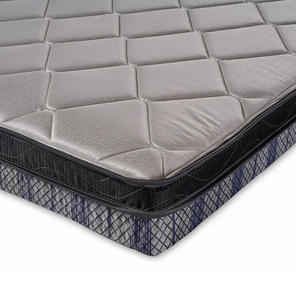 Gray and black quilted mattress corner.