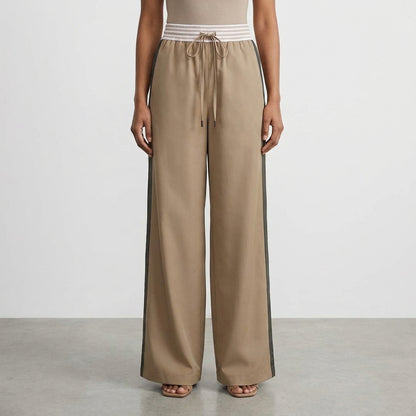 Tan wide-leg pants with drawstring waist and side stripes.