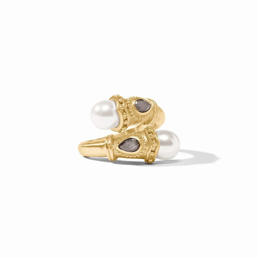 Two ornate gold rings featuring white pearls and dark teardrop-shaped gemstones.