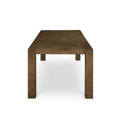 Wooden table with thick legs, viewed from the narrow side.