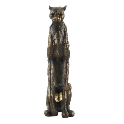 Bronze sculpture of a seated wild cat.