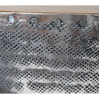 Metal surface with a grid pattern and round rivets.
