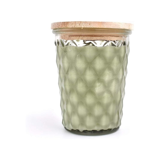 Textured green candle jar with a wooden lid.