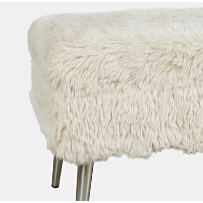 Fuzzy white stool with metal legs.