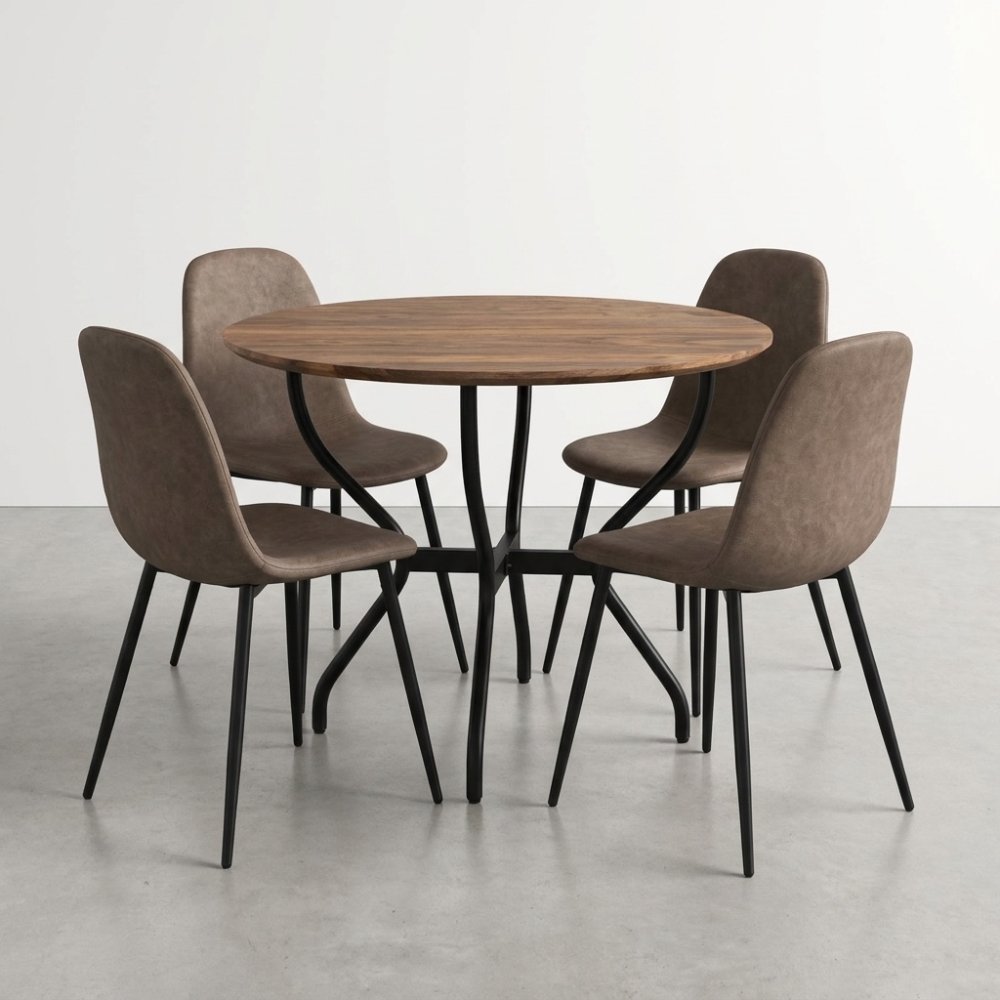 Round wooden table with four brown chairs on a gray floor.