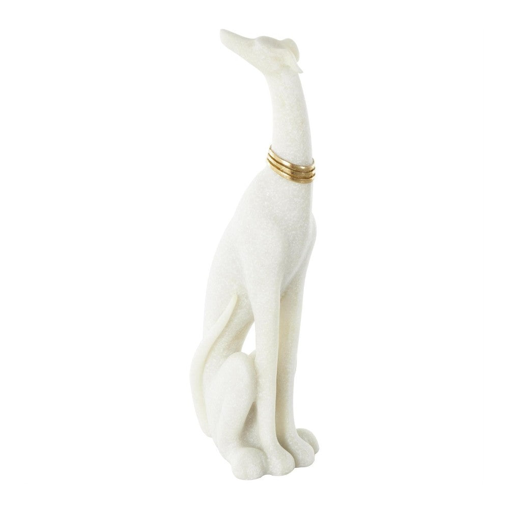 Elegant white dog sculpture with a gold collar.
