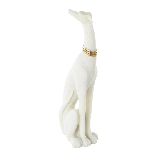 Elegant white dog sculpture with a gold collar.