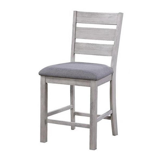 Gray wooden chair with cushioned seat and slatted back.