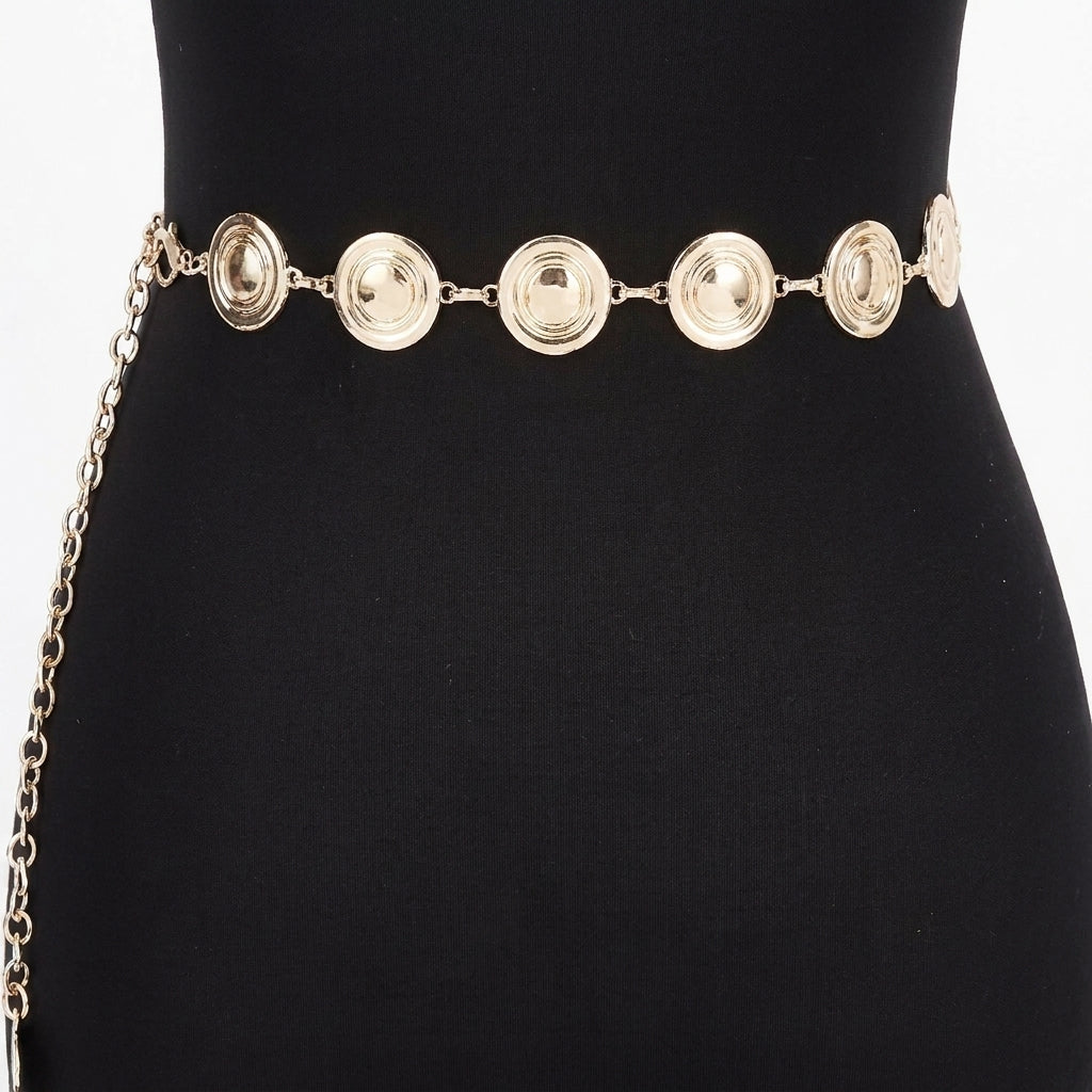 Gold chain belt with round medallions on a black background.