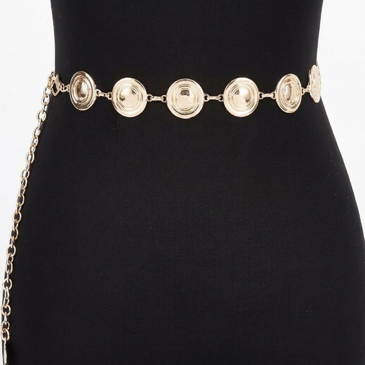 Gold chain belt with round medallions on a black background.