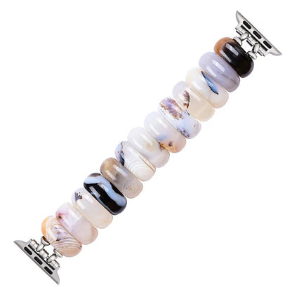 Watch band with colorful, rounded beads on metal connectors.