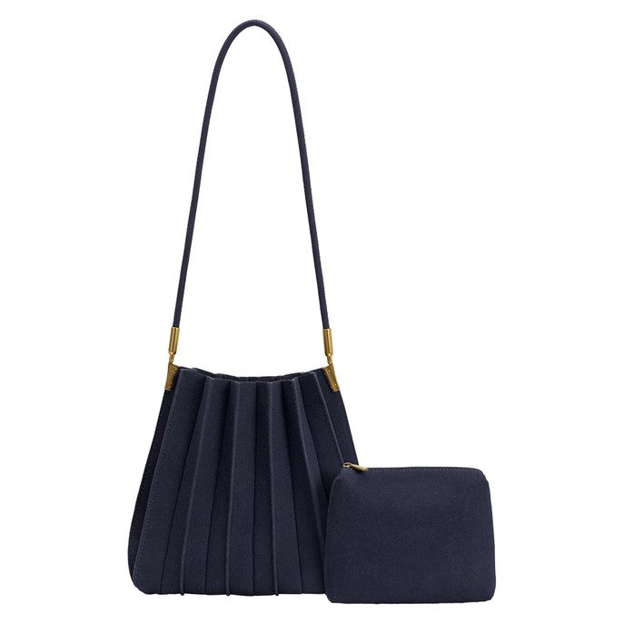 Navy pleated handbag and matching pouch with gold accents.