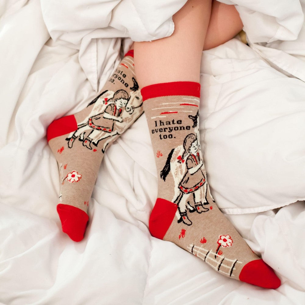Socks with a whimsical design and "I hate everyone too" text.