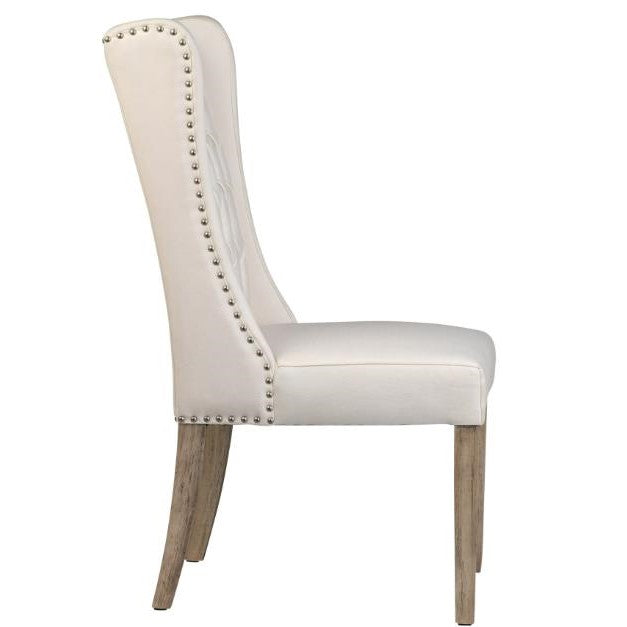 Elegant white chair with tufted back and wooden legs.