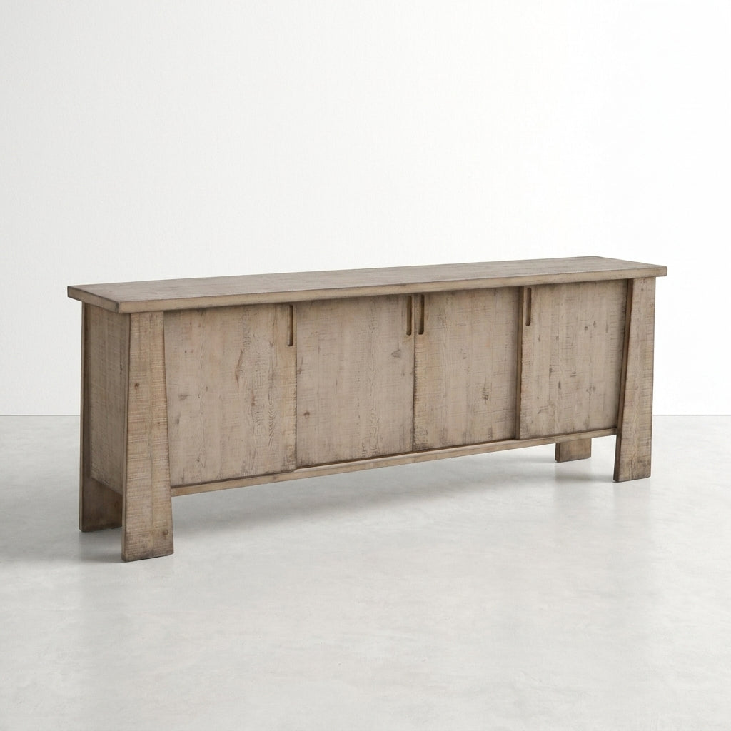 Rustic wooden sideboard with sliding doors on a white background.
